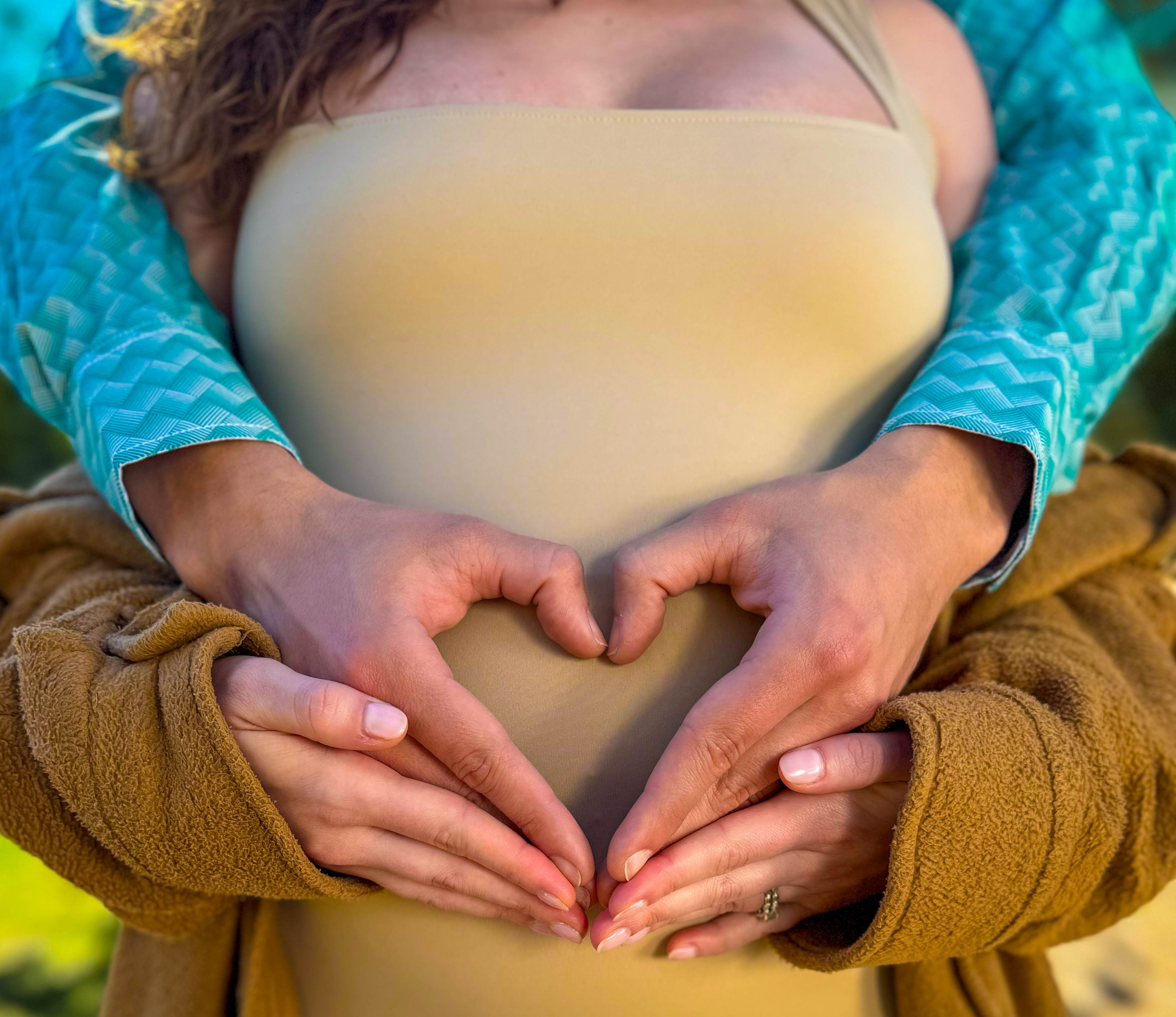 Expecting couple in nature